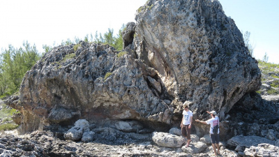 Dr. Alessio Rovere and PhD student Thomas Lorscheid standing by the boulder called “bull”.  Photo: Elisa Casella
