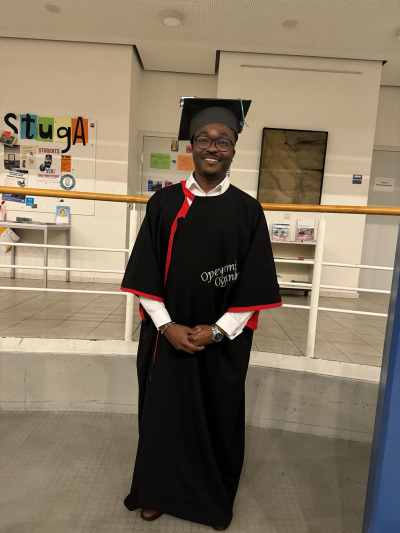 Opeyemi Ogunleye with his doctoral hat and cape