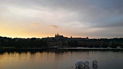 Vltava River with the view of the Charles Bridge and the Prague Castle