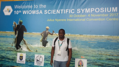 At the entrance of the conference