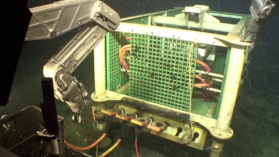 Remotely operated vehicle JASON connects instruments to a junction box of the OOI Cabled Observatory during the VISIONS'17 operation and maintenance expedition. Photo: NSF, OOI, UW, ROV JASON
