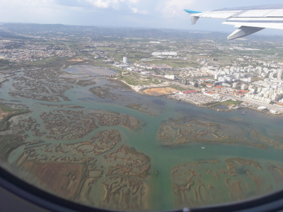 Aerial view on the Ria Formosa lagoon and the city of Faro at the Algarve coast.