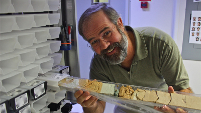Richard D. Norris with the drill core obtained on IODP expedition 342 showing the K-Pg boundary Photo: IODP