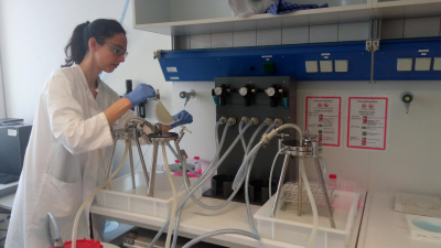 Silvia Vidal-Melgosa at the set up used for the sampling of particulate organic matter by sequential filtration of 100 litre of seawater at Helgoland. The picture shows the collection of one filter where organic matter (in this case matter with molecular 