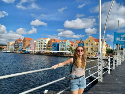 Bianca in front of the iconic Dutch houses of Willemstad, Curaçao.