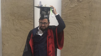 Leonardo with his doctoral hat and gown