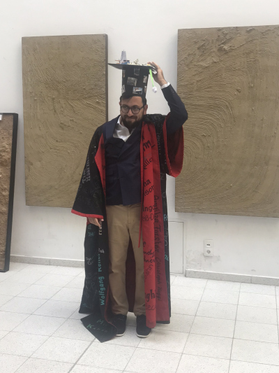Leonardo with his doctoral hat and gown