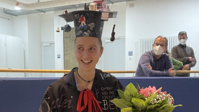 Victroia Kürzinger with her doctoral hat