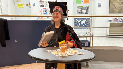 Nina-Marie Lešić with her doctoral hat and gown
