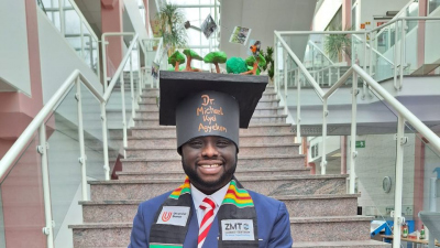 Michael Kyei Agyekum with his doctoral hat