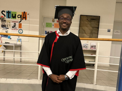 Opeyemi Ogunleye with his doctoral hat and gown