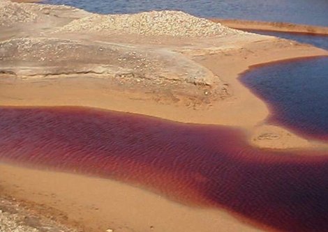 Acid residual lake in lignite mine overburden material.