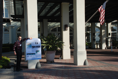 I am holding my poster in front of the Hotel Galvez, Galveston, Texas where the GRS and GRC took place. At GRCs no photos are allowed inside the conference areas.